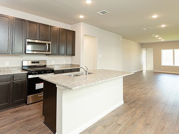 Dining Area to Kitchen and Family Room