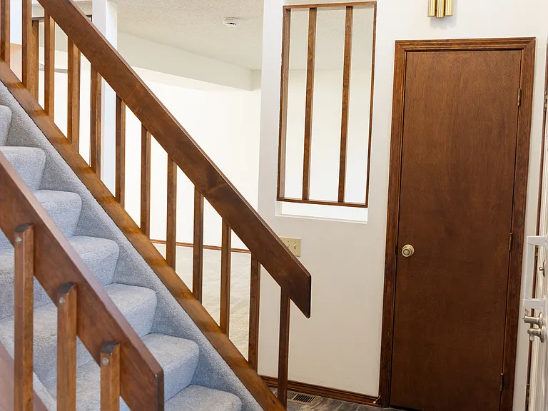 Entry - stairs have new carpet and lead to the upper level.