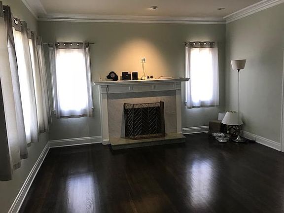 Living Room with its wood-burning fireplace