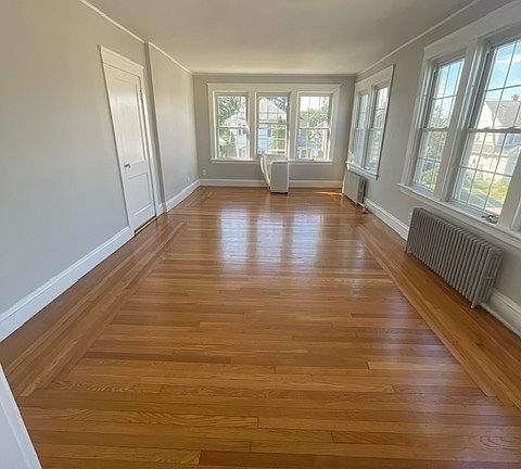 double size family room loaded with windows