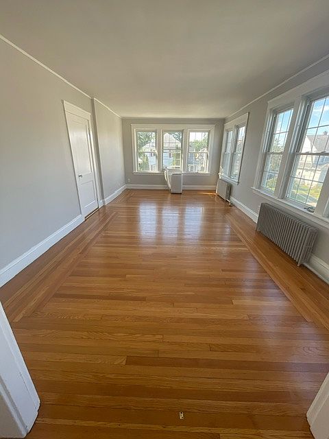 double size family room loaded with windows
