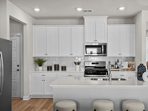 Kitchen in the Brentwood floorplan at a Meritage Homes community in Greenville, SC.