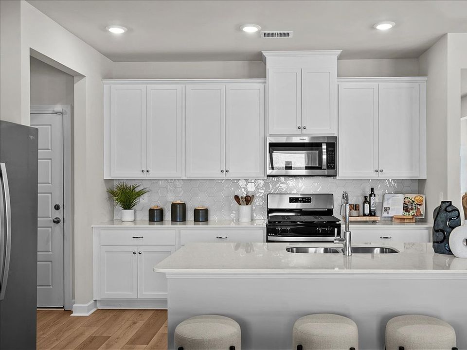 Kitchen in the Brentwood floorplan at a Meritage Homes community in Greenville, SC.