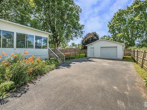 Carriage House garage is technically a one car due to the door size but look how big it is!