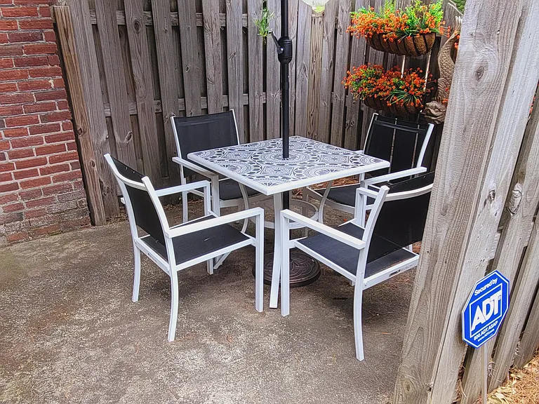 Private outdoor patio outside of door to dining room
