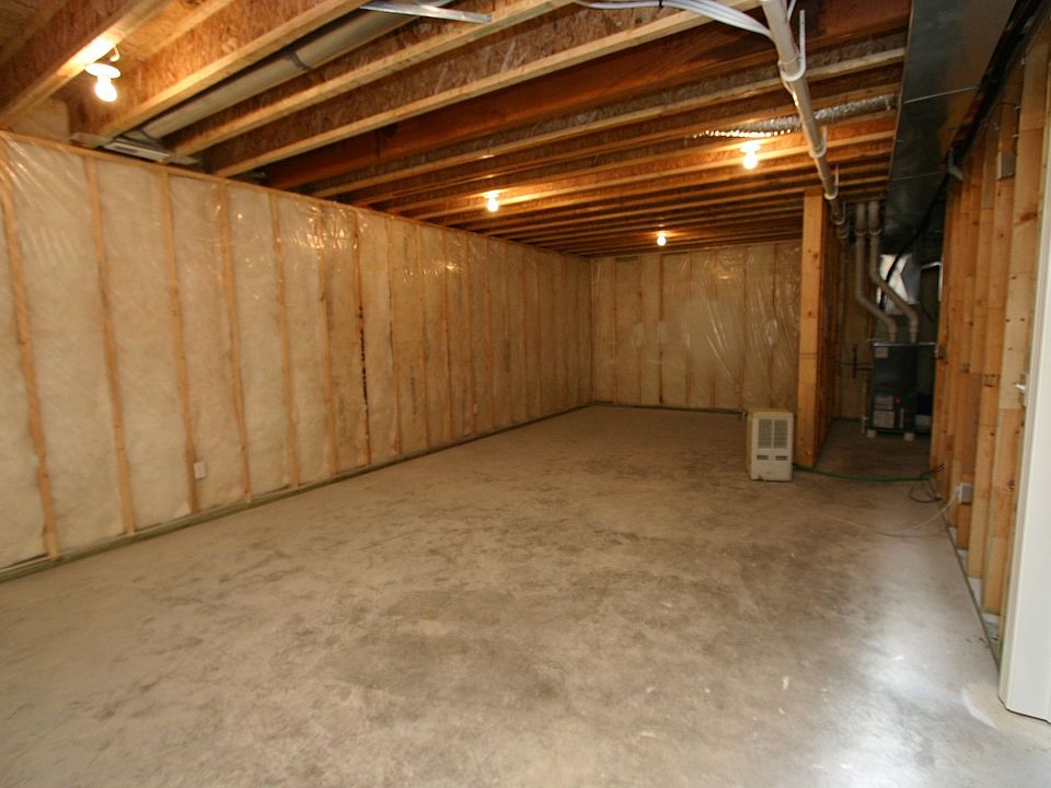 unifnished basement with stude, wire & insulate