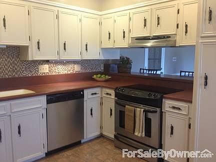 Solid surface counters/ Stainless Applia
						:
						Kitchen looking toward breakfast bar