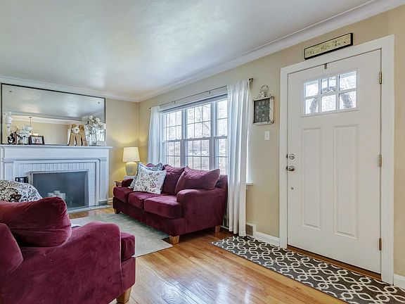 Living Room with fireplace and large picture window.