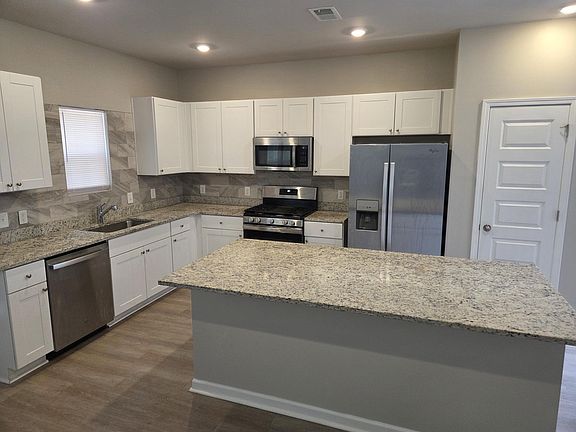 4th image of 8034 Reagan Way