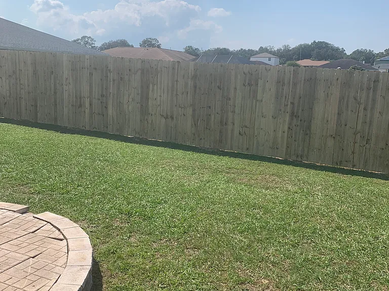 8' fence for additional privacy in backyard.