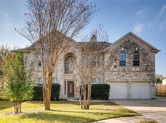 Texas Stone home is located on a cut-de-sac and backs up to a greenbelt.
