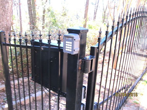 Gate to Back Yard & Garage