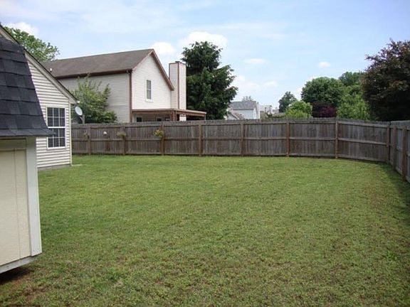 Large, fenced backyard