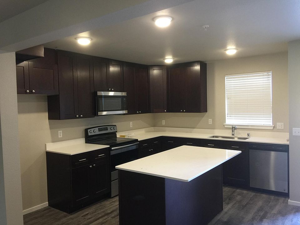 Dark Cherry Wood in every other Apartment
