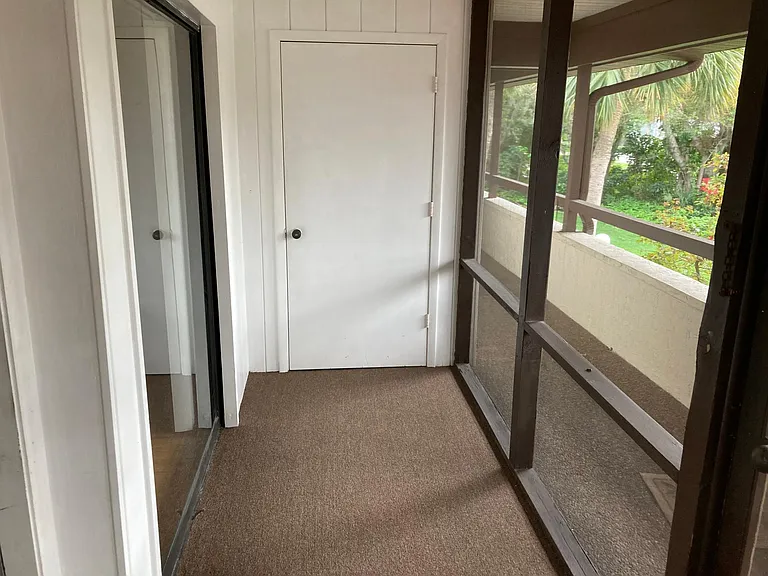 Front porch with storage room.