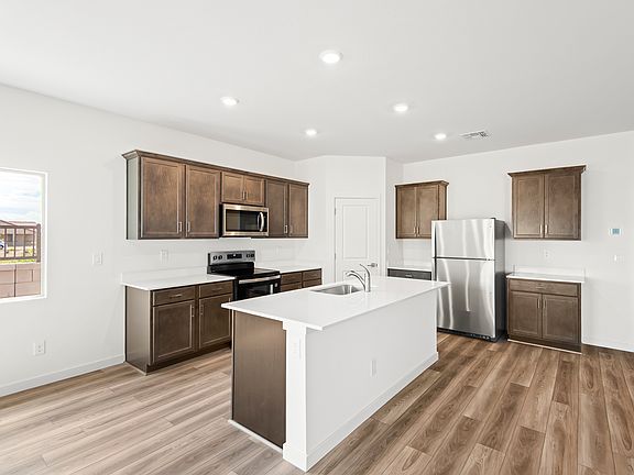 The spacious breakfast bar makes the perfect spot for a quick meal.