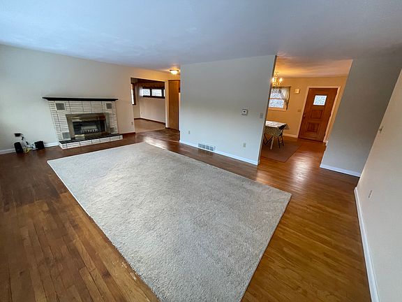 Livingroom view towards Dining, Kitchen and Bonus Room