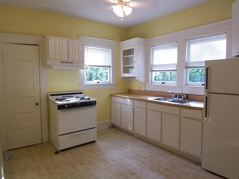 Kitchen with pantry, ceiling fan over looking deck
