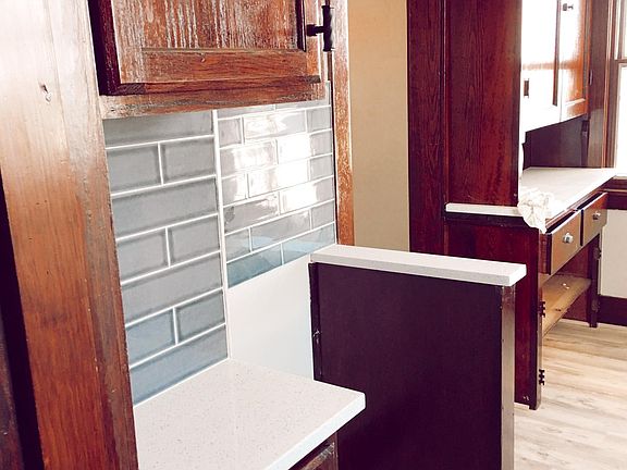 brand new cabinets, counters and stainless steel appliances.