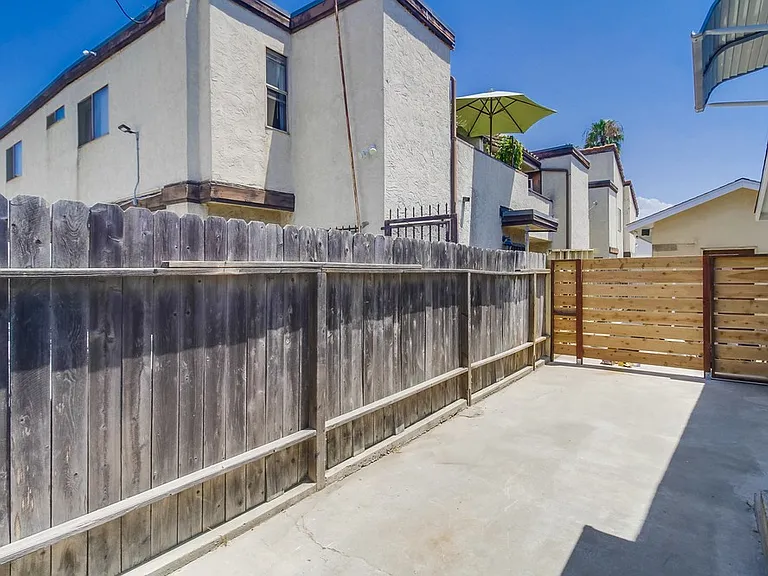 Gated, Private Yard & Two Tandem Parking Spots