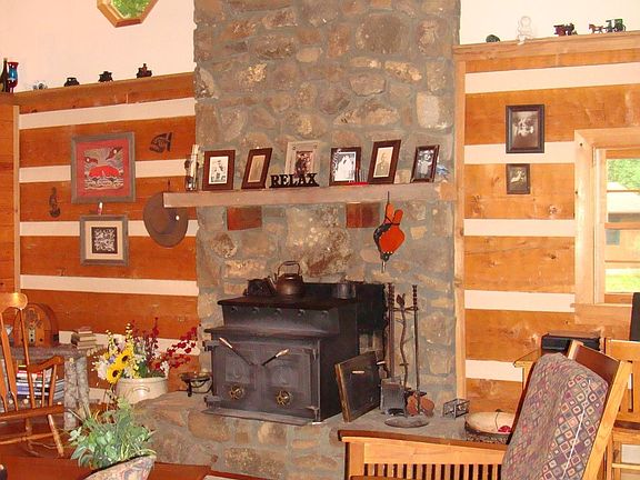 Living Room with a beautiful rock fireplace