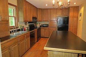 Spacious Kitchen with Oak Cabinets