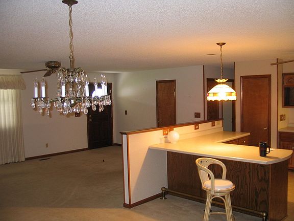 Living room/Kitchen/Dining Room area without furniture