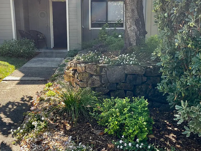 newly landscaped in front of condo entrance
