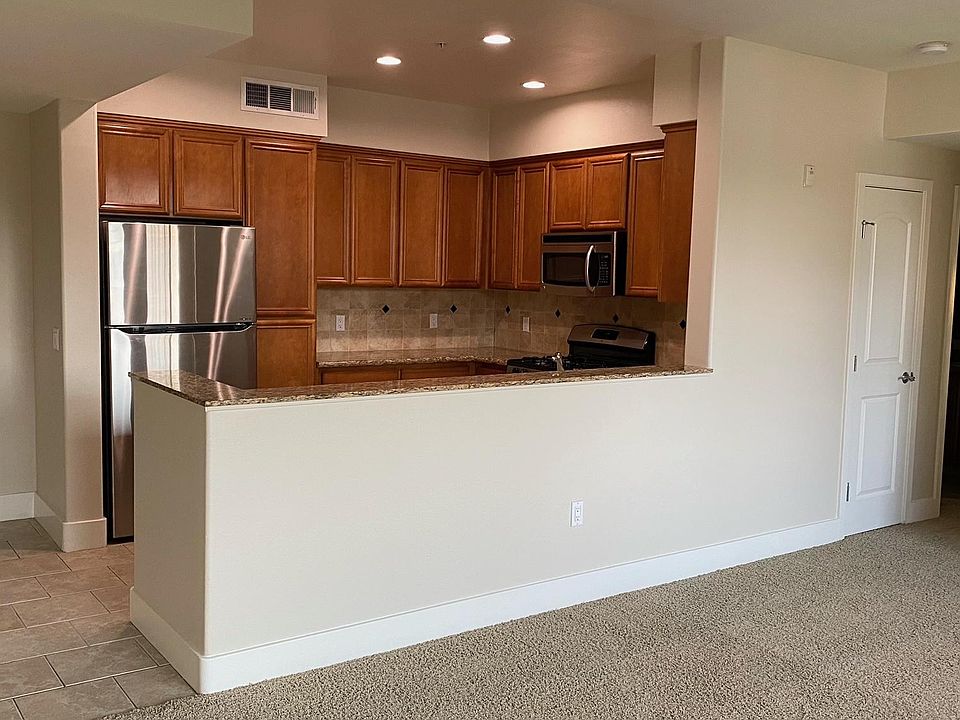Front door entry with Gourmet kitchen with ss refrigerator, gas stove, dishwasher & microwave