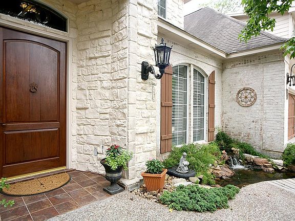 Grand Entry with Custom Wood Door.