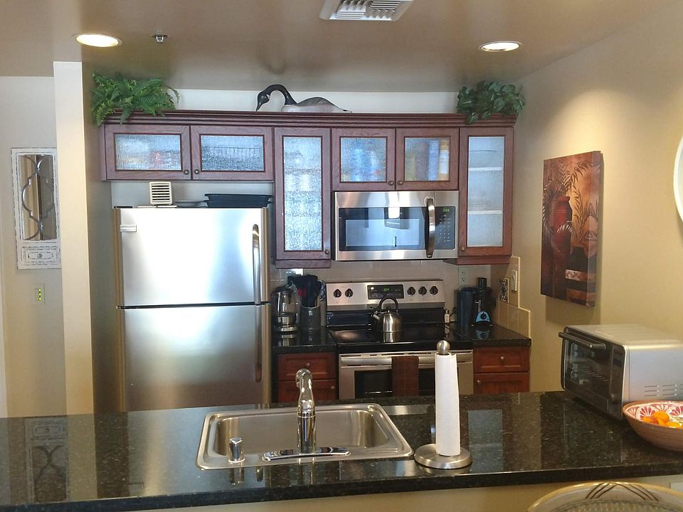 New stainless steel appliances including Refrigerator, Oven, Stovetop, Microwave, AND Dishwasher!