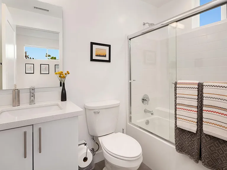 Full bathroom adjacent to second bedroom.