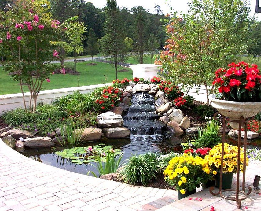 1 of 2 Koi Ponds at entryway
