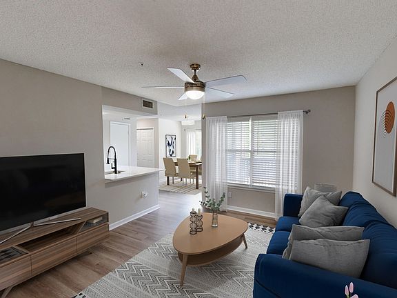 Newly Renovated Living Room wiith Gorgeous Hardwood-Style Flooring