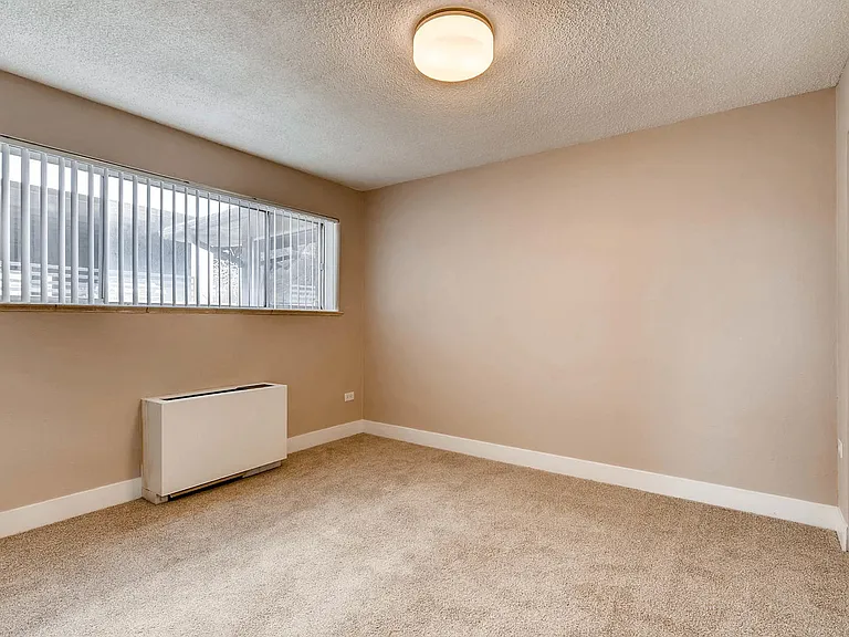 Our Apartment Large Bedroom at Scandia Apartments in Englewood, Colorado