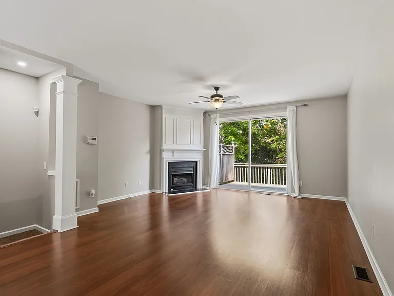 Living and dining room view with gas fireplace