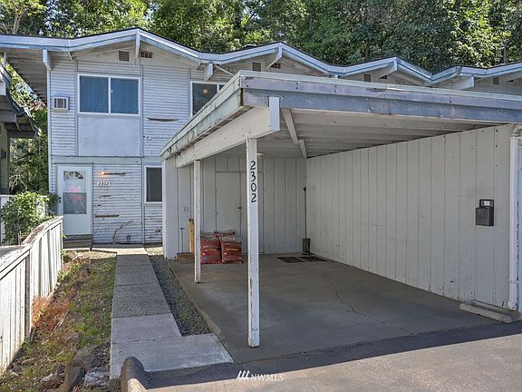 Carport with storage and unit entry