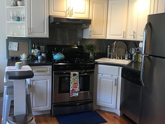 Open kitchen, gas stove, stainless steel appliance