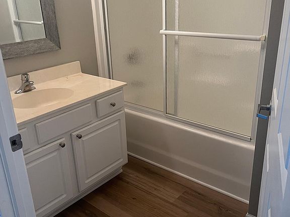 2nd bathroom with tub and linen closet