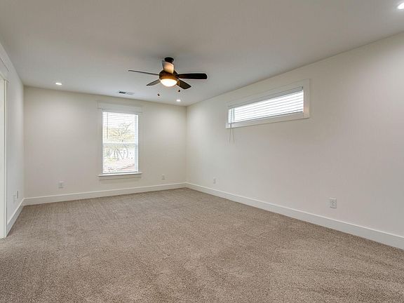 Primary bedroom suite located upstairs