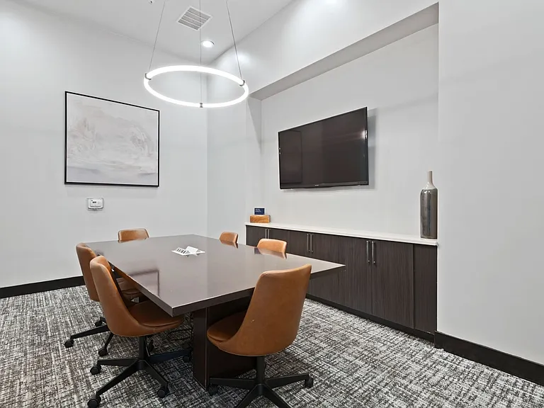 A refined conference room designed for focus, collaboration, and seamless productivity.