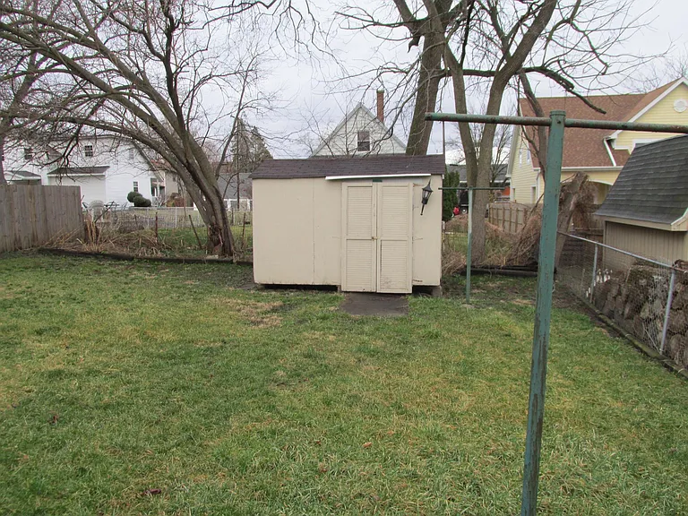 fenced backyard, shed