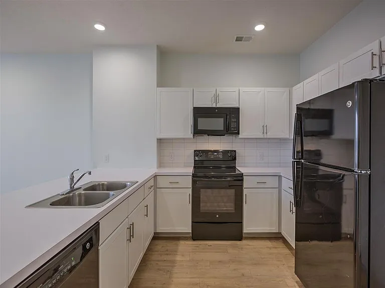 Closer look at a kitchen in a unit at The Rise.