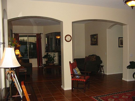Home boasts arches and niches throughout, wooden floors, tile throughout, etc!