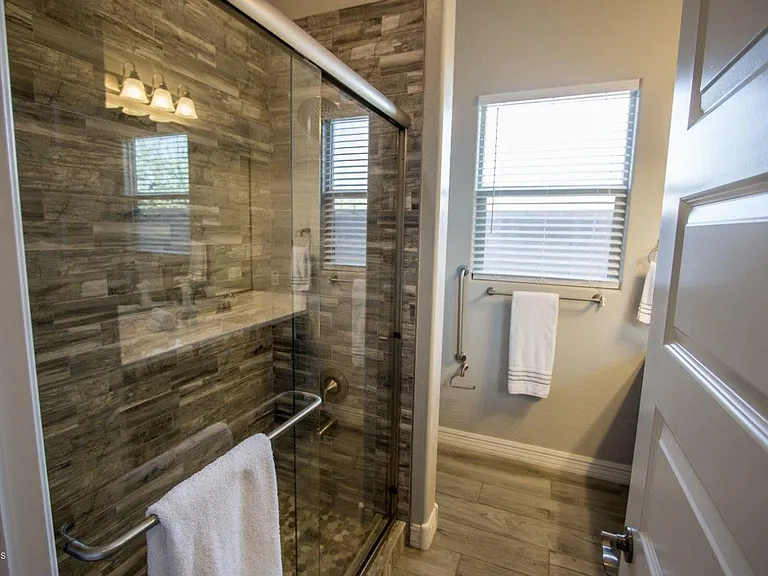 9775 W Rowel Rd — Photo 19