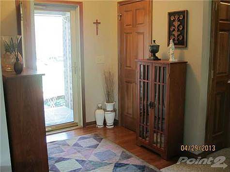 Foyer with wood floor