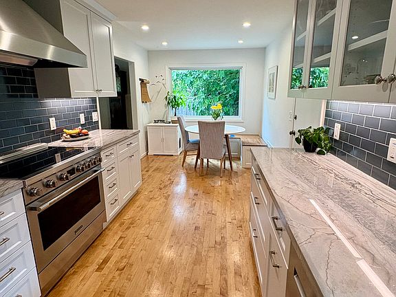 Kitchen: Frigidaire induction stove and Electrolux dishwasher