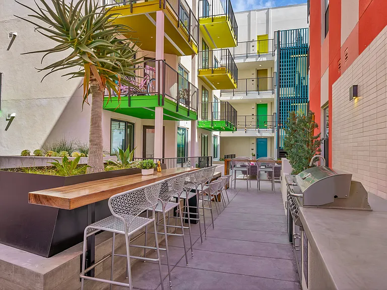 Community outdoor kitchen with BBQ and Hibachi grill.