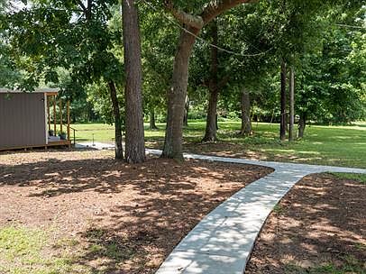 Nice big back yard and laundry room with coin operated machines for your convienence.