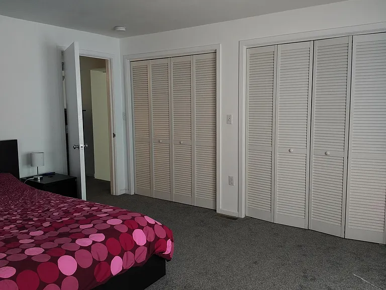 bedroom with closets